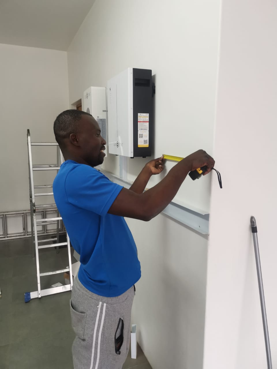 worker measuring wall for inverter